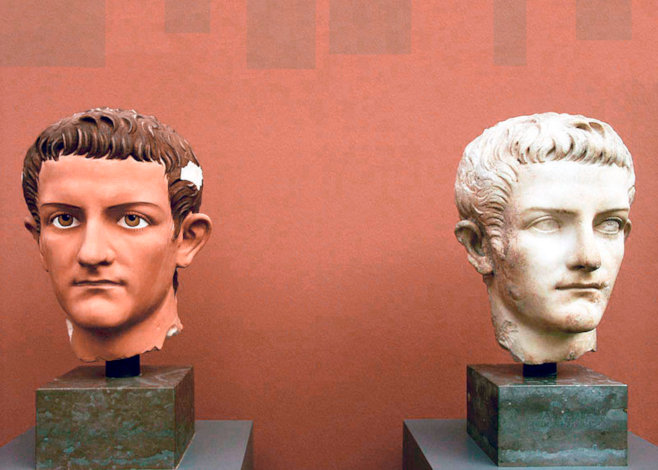 Ny Carlsberg Glyptotek, København's photo: A marble bust of Caligula (right) with traces of original paint and a plaster replica (left) approximating the polychrome traditions of ancient sculpture.