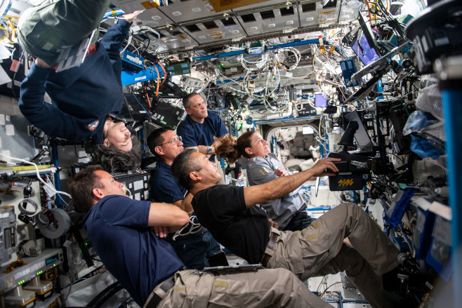 NASA's photo: 'Expedition 68 crew members participate in an evening conference with International Space Station mission controllers on the ground. From front to back, NASA astronaut Josh Cassada; JAXA astronaut Koichi Wakata; ESA astronaut Samantha Cristoforetti; and NASA astronauts Frank Rubio, Nicole Mann, and Bob Hines.' (October 2022)