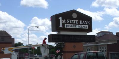 Bank sign getting fixed in Sauk Centre, Minnesota
