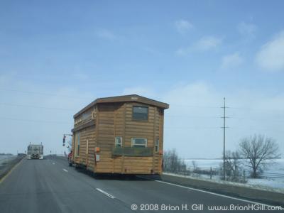 Log house on the road, I94, Minnesota