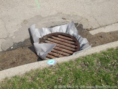 Mystery wrap on storm drains in Sauk Centre, Minnesota. 
