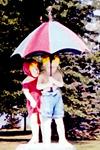Statue of boy and girl under an ubrella in Sauk Centre