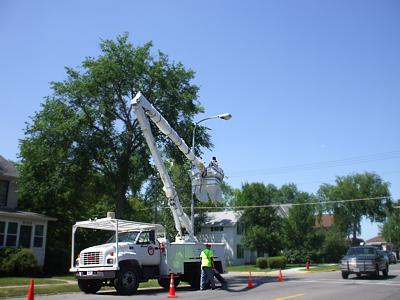 Light pole maintenance on Main in Sauk Centre, Minnesota