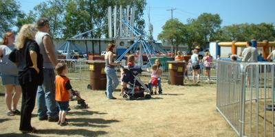 Families at the Stearns County Fair, Sauk Centre.