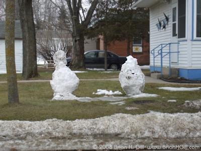 Snowmen in springtime, Sauk Centre, Minnesota